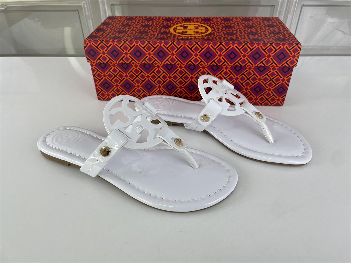 TORY Burch White with Brown bottom sole slipper
