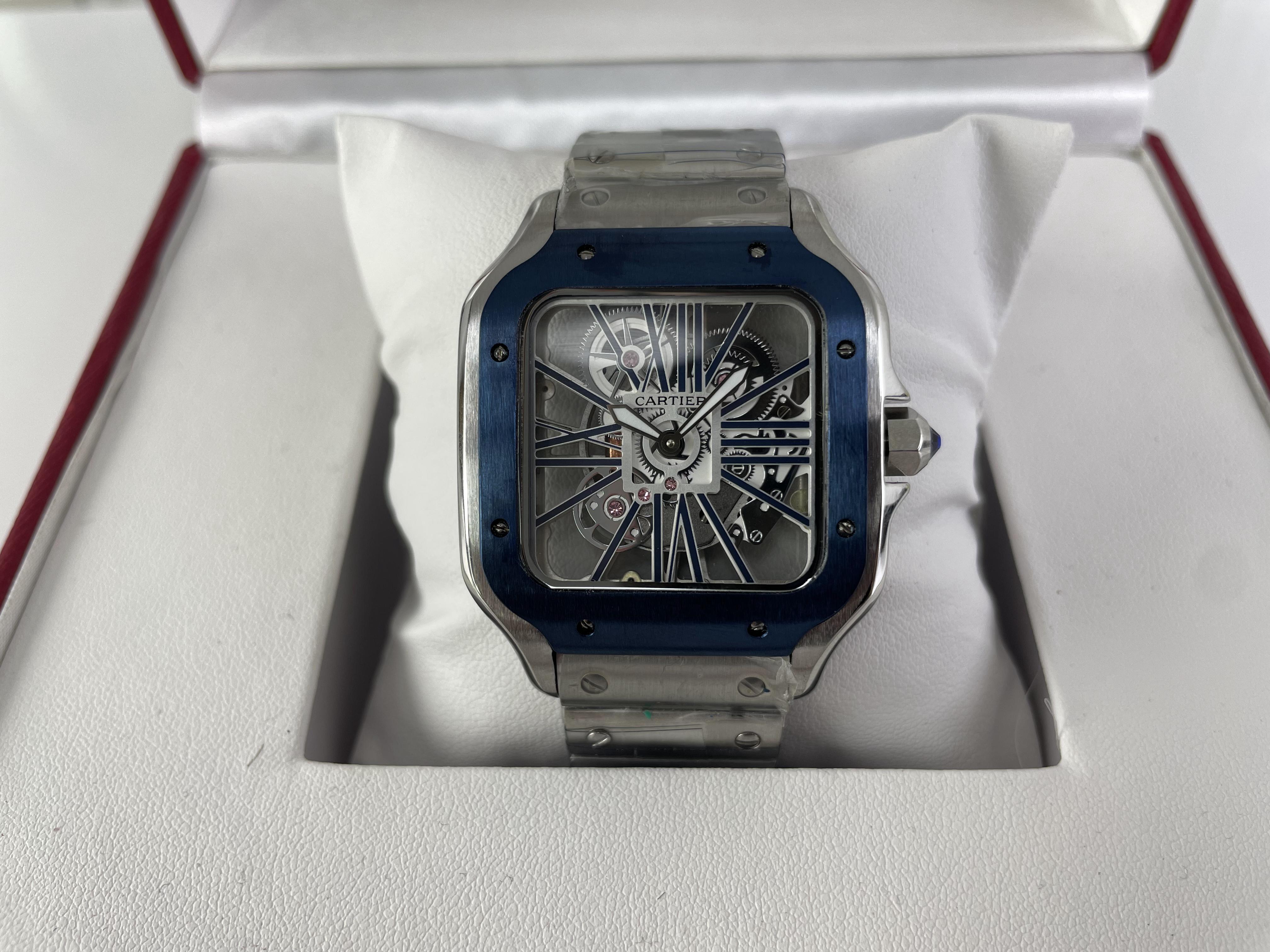 Cartier Santos Blue Silver Hollow Out quartz watch, (47.5 x 39.8 x 9.38 mm)